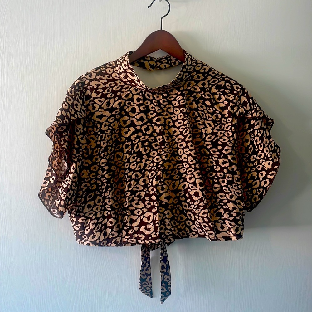 Cropped open back cheetah print blouse